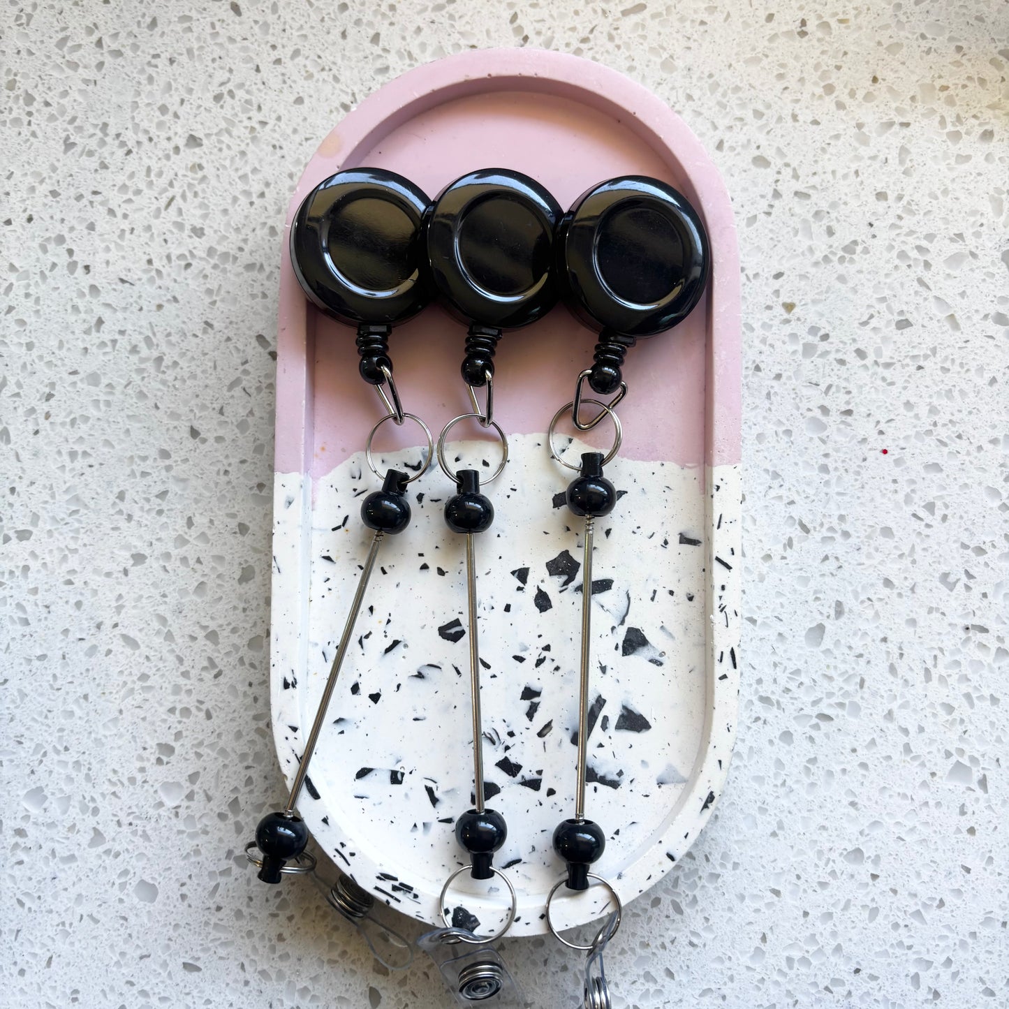 Black Badge Reel With Beadable Post