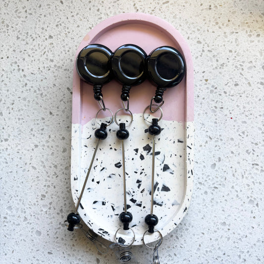 Black Badge Reel With Beadable Post